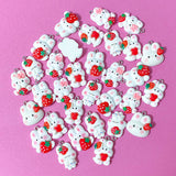 white rabbit rabbits bunny bunnies resin charm pendant charms red strawberry strawberries heart hearts pink bow ears uk cute kawaii craft supplies spring pretty pendants