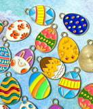 easter egg eggs gold tone metal enamel enamelled charm charms pendant spring springtime cute kawaii craft shop supplies uk bright colourful pink yellow chick bunny blue green orange teal turquoise white floral flowers striped stripes