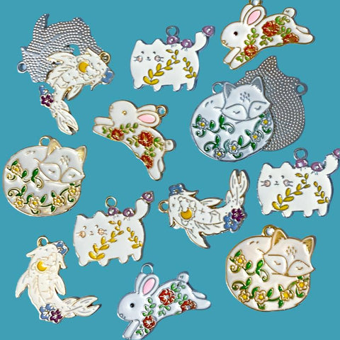 white enamel fox foxes fish rabbit rabbits bunny bunnies floral uk cute kawaii charms charm flower flowers white silver gold tone metal enamel enamelled craft supplies spring nature cat cats kitty kitten