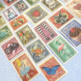 alice in wonderland sticker stickers stamp stamps vintage style illustration tenniel lewis carroll big stationery uk set pack postage stamps stickers rabbit white bunny hat mad hatter red queen of hearts pocket watch mushroom key drink me cake eat me cheshire cat potion messenger guard butterfly colourful retro vibe vibes feel nostalgic planner supplies rose roses teacup cups