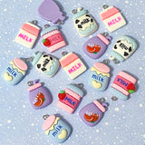 milk drink drinks charm charms pendant pendants strawberry cow cows print pink lilac purple white blue carton cartons uk cute kawaii craft supplies shop crafts jewellery making strawberries cherry cherries