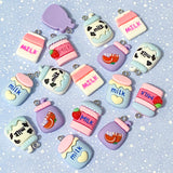milk drink drinks charm charms pendant pendants strawberry cow cows print pink lilac purple white blue carton cartons uk cute kawaii craft supplies shop crafts jewellery making strawberries cherry cherries