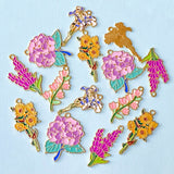 spring summer flower flowers bloom blooms garden plant plants pink lilac yellow purple white blossom gold tone metal enamel charm charms pendant pendants uk cute kawaii craft supplies shop store hydrangea lupin sunflower sunflowers yellow orange