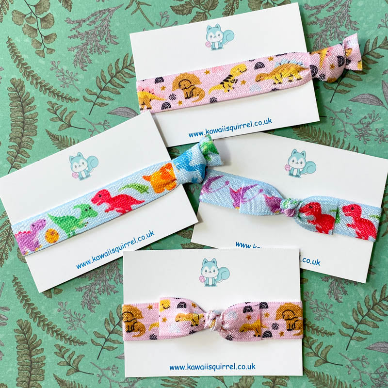 handmade hand made dino dinosaur dinosaurs hair tie ties bow bows cute kawaii kid's gift gifts blue pink baby fun pretty uk presents