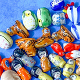 ceramic clay handmade painted glass bead beads owl matryoshka russian doll geisha tiger chicken dog puppy penguin bird skull uk cute kawaii craft supplies