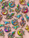 metal metallic rainbow titanium charm charms ornate pretty pendant pendants squid kraken octopus sloth sloths bat bats uk cute kawaii craft supplies jewellery making