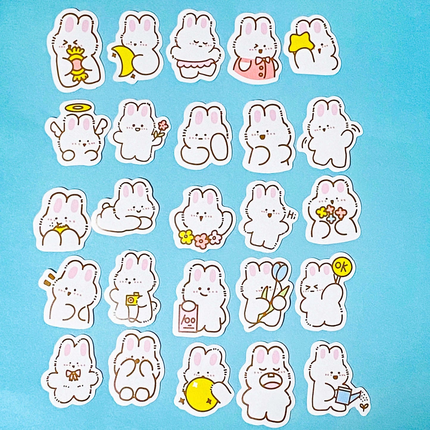 cute rabbit stickers on a blue background