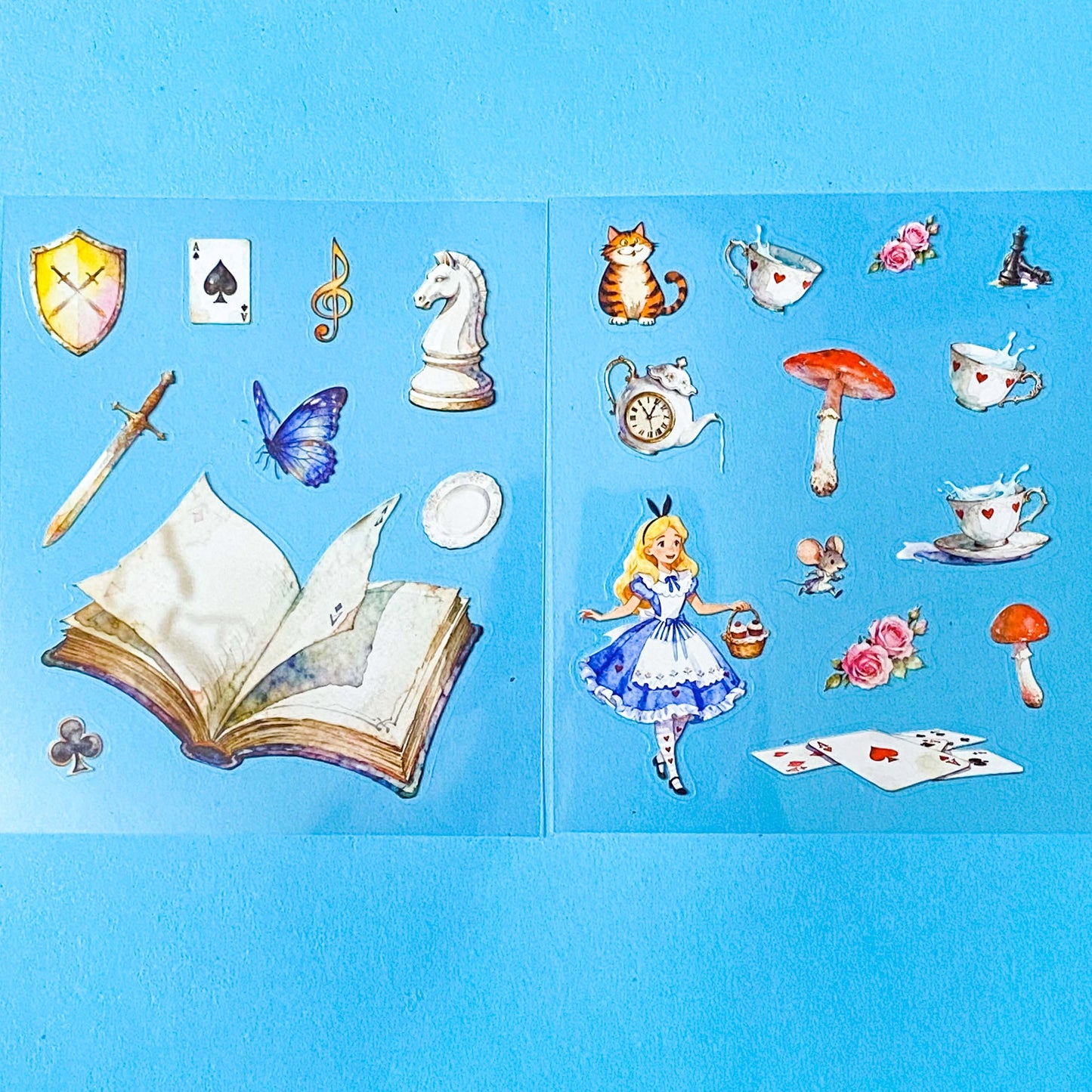 alice inspired mad hatter tea party snow globe PET sticker scene set with transparent stickers, card scene and teacups, books, mushrooms and cheshire cat illustrations