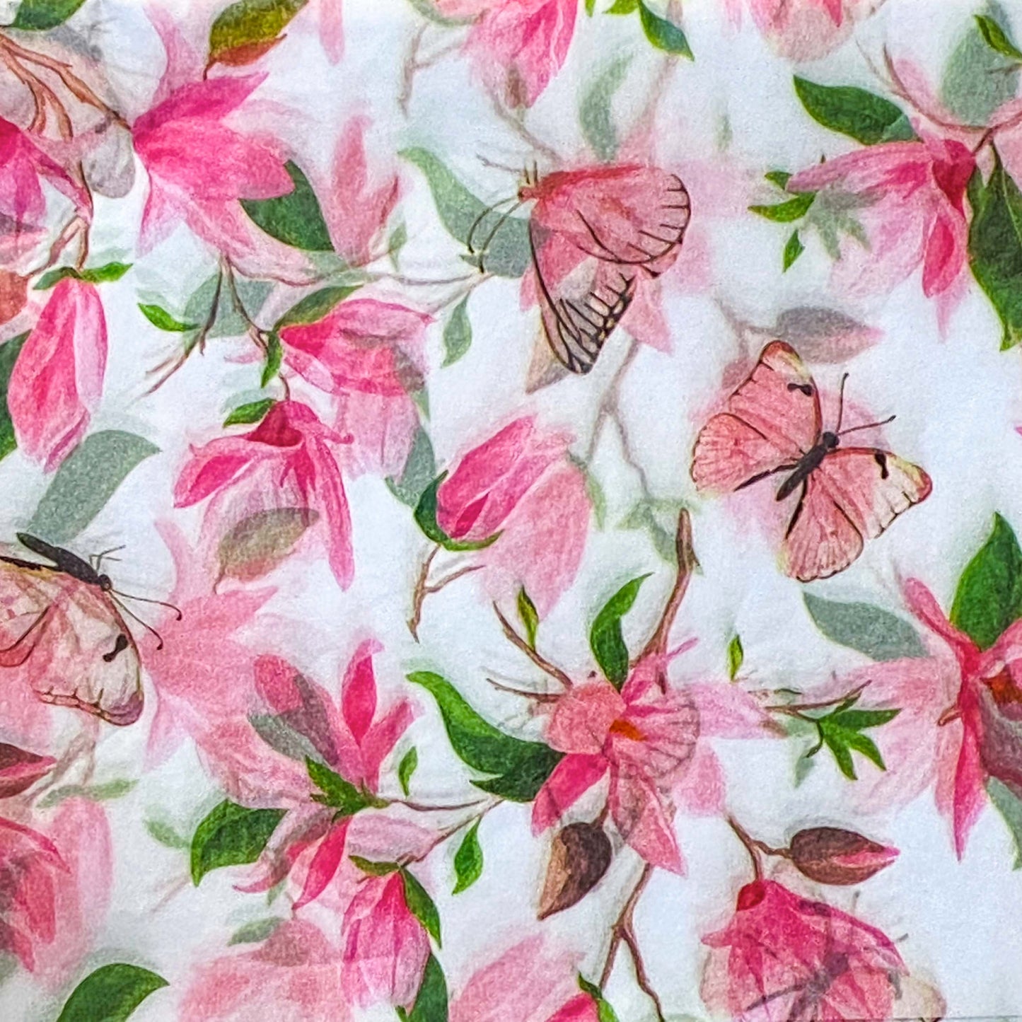 pink butterflies and flowers tissue paper on a white background