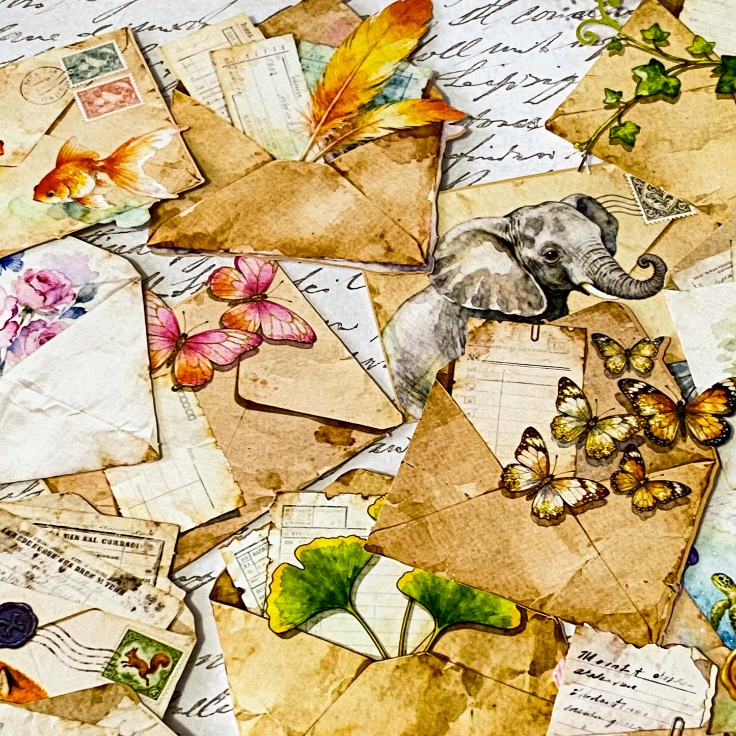 vintage die cuts of antique envelopes and letters with butterflies, animals, birds, leaves and feather decorations in sepia tone for journaling and scrapbooking