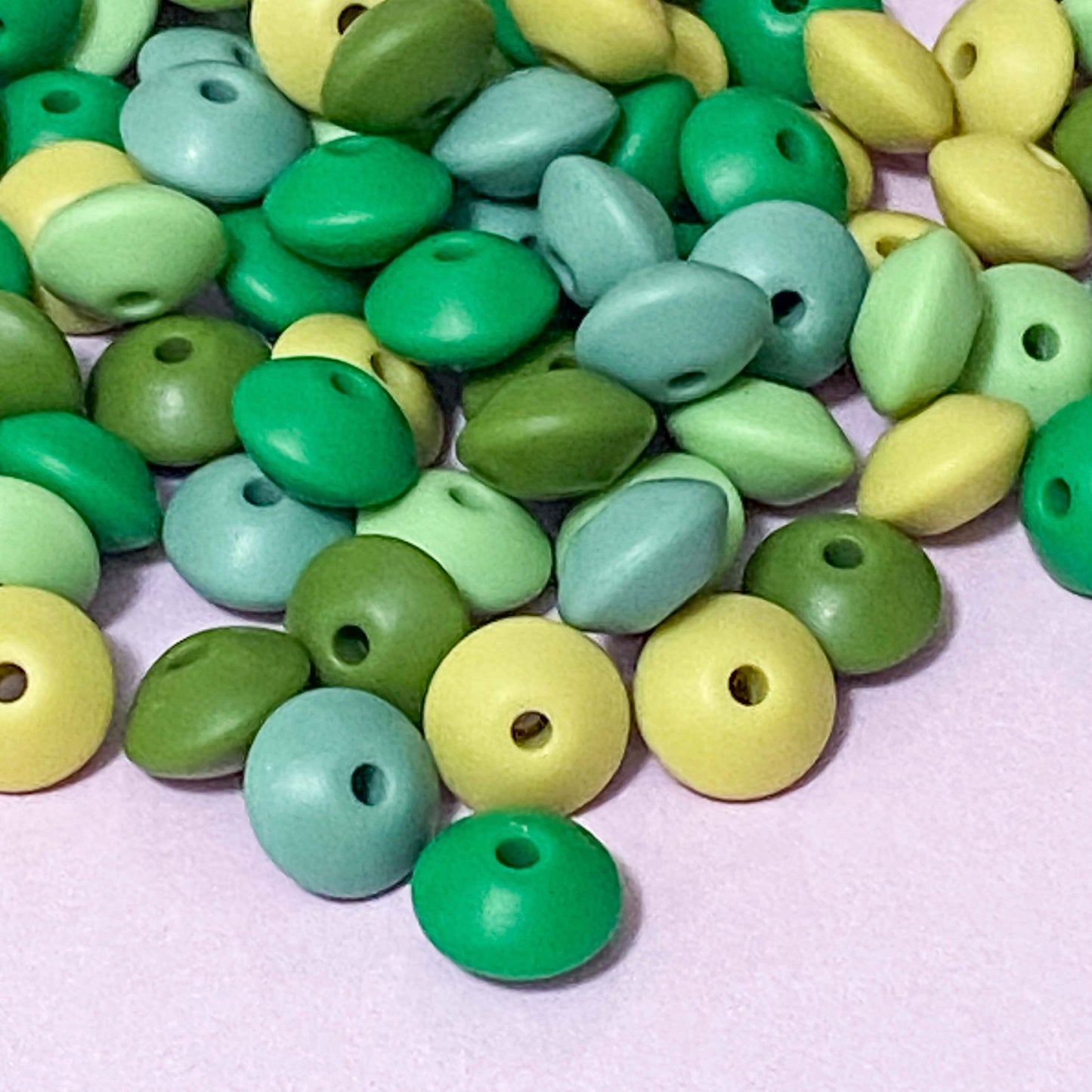 green shades of small flat abacus bead beads silicone spacer spacers 12mm 7mm flattened bean beans uk cute kawaii craft supplies shop store khaki chartreuse light green pack crafts