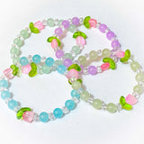 glass handmade stretch bracelet bracelets bead beads uk cute kawaii floral flower tulip tulips spring gift gifts stocking filler fillers lilac blue green pink adult adults leaf leaves