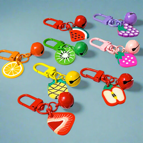 metal and enamel key ring rings clip clips bag charm charms jingle bell bells fruit fruits orange melon watermelon kiwi strawberry strawberries grape grapes purple pink red yellow pineapple green gift gifts uk stocking filler present