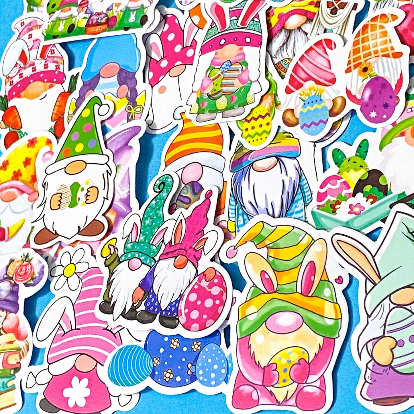 large bundle of spring and easter laptop stickers with easter eggs, bunny rabbits, gnomes and baskets illustrations. bargain stationery bundles uk.