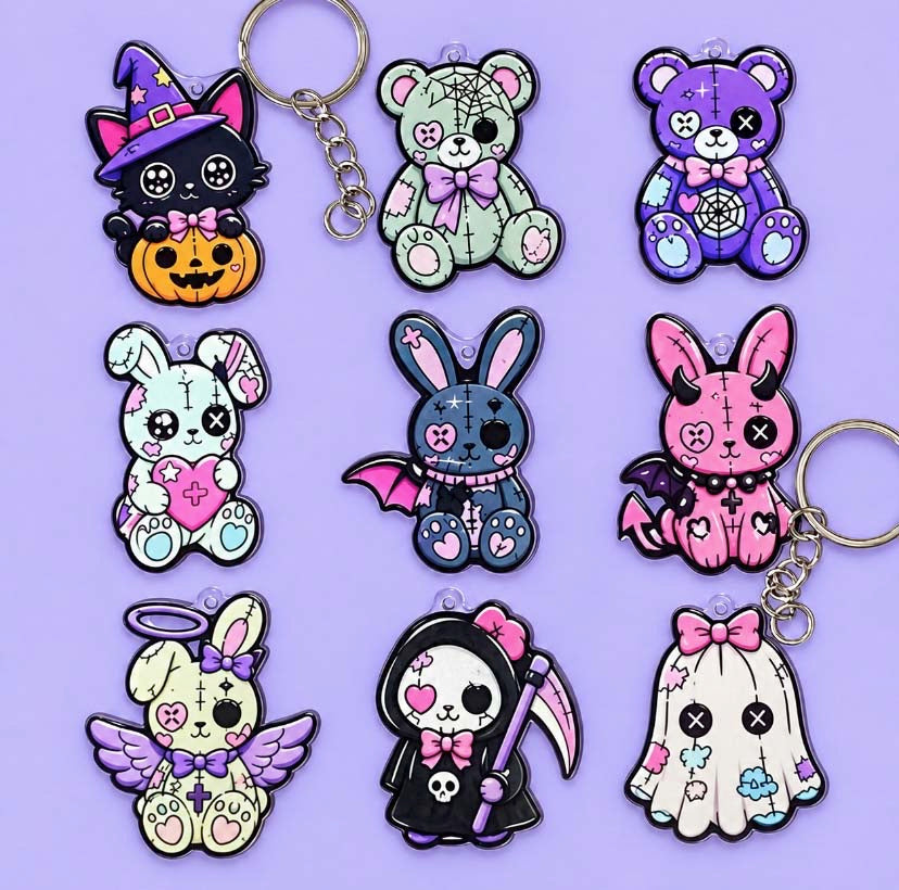 acrylic halloween spooky cute DIY keyring kit in pretty hessian bag with silver metal findings. Designs include kawaii ghost, black cat with pumpkin, cuddly toy bear and rabbit, angel, devil and grim reaper. uk gift shop.