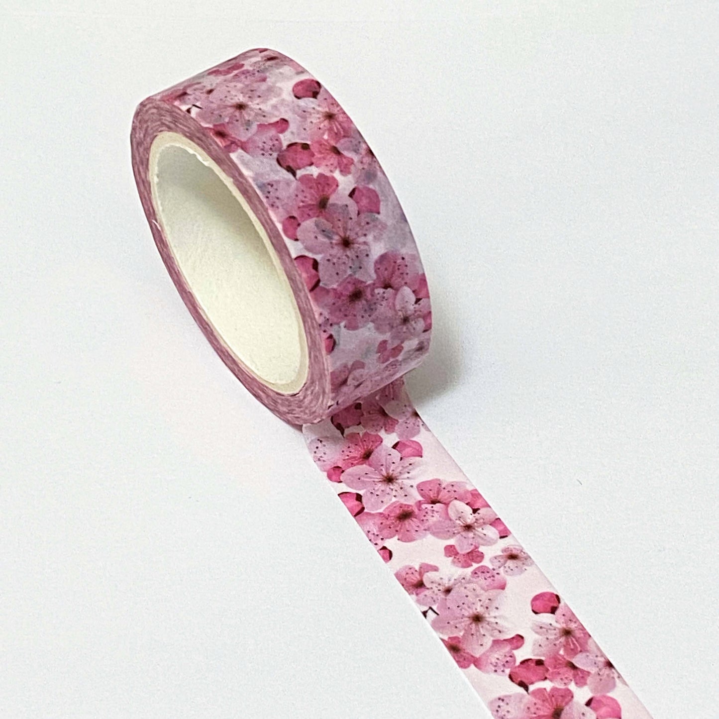 pink cherry blossom petals 10m washi tape roll on a white background