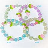 glass handmade stretch bracelet bracelets bead beads uk cute kawaii floral flower tulip tulips spring gift gifts stocking filler fillers lilac blue green pink adult adults leaf leaves
