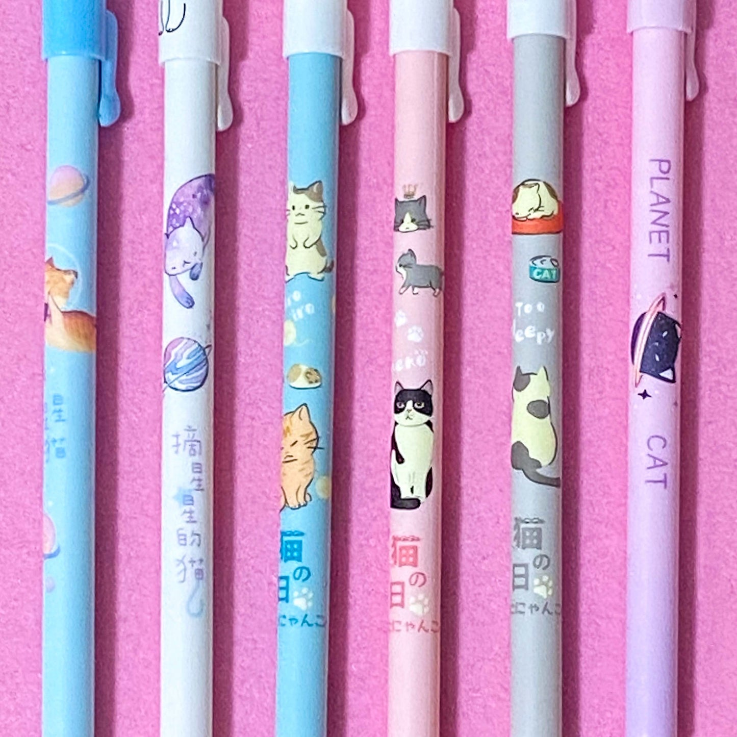 adorable cats pens for any kitty lover on a pink background