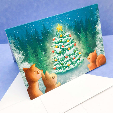 greeting greetings card cards christmas festive uk handmade kawaii cute stationery hand made forest wood woodland fir tree tree cute animals deer squirrel rabbit blue turquoise pretty colours illustrations artist art brown traditional