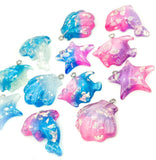 glitter resin ocean sea creatures charm charms pendant pendants dolphin fish shell shells starfish uk cute kawaii craft supplies
