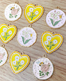 spring charms enamel charm heart hearts yellow pink flower flowers bee bees butterfly gold tone metal daisy rose butterfly uk craft supplies large big pendant
