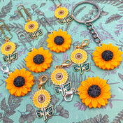 sun flower sunflower sunflowers planner charm charms clip clips paper keyring key ring uk cute kawaii gifts planning accessory golden silver metal enamel resin orange yellow handmade hand made gifts yellow floral
