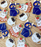 cute kawaii cat charm charms midnight blue large cat moon face strawberry cake gateau pink teacup coffee cup cups gold tone metal enamelled uk craft supplies black red white