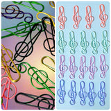 Colorful treble clef paper clips on a gradient background with a sheet of identical paper clips.
