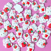 white rabbit rabbits bunny bunnies resin charm pendant charms red strawberry strawberries heart hearts pink bow ears uk cute kawaii craft supplies spring pretty pendants