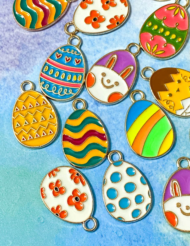 easter egg eggs gold tone metal enamel enamelled charm charms pendant spring springtime cute kawaii craft shop supplies uk bright colourful pink yellow chick bunny blue green orange teal turquoise white floral flowers striped stripes
