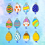 easter egg eggs gold tone metal enamel enamelled charm charms pendant spring springtime cute kawaii craft shop supplies uk bright colourful pink yellow chick bunny blue green orange teal turquoise white floral flowers striped stripes