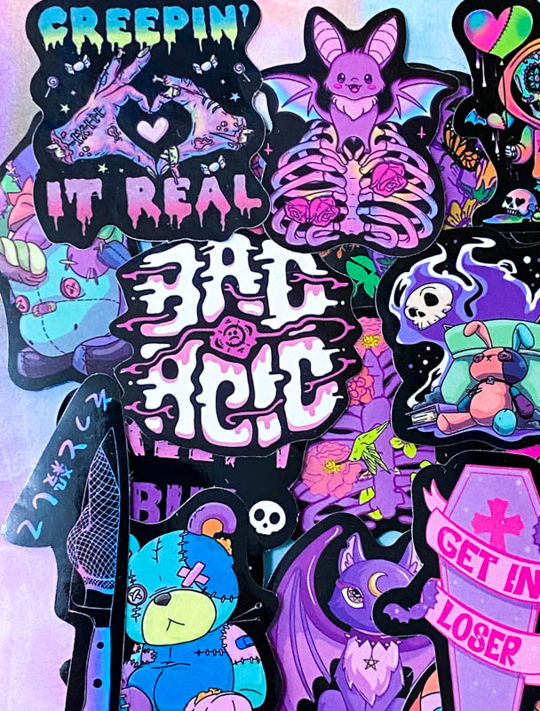 spooky but cute kawaii goth gothic sticker stickers laptop stationery uk pack set bright vibrant skull skulls coffin halloween spooky snake bat bats death graveyard potion magic spell spells witchcraft heart purple magenta black yellow blue orange vivid eyeball