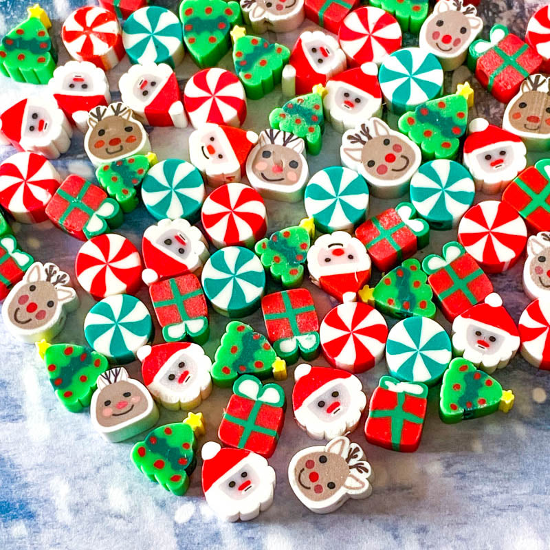 polymer clay christmas bead beads bundle pinwheel pinwheels pin wheel wheels santa santas claus father tree trees reindeer rudolph present red green white festive uk cute kawaii craft supplies shop store