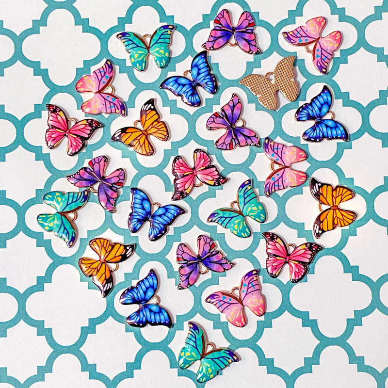 butterfly butterflies enamel bright gold tone charm charms orange blue turquoise pale pink lilac green metal beautiful butterflies uk craft supplies cute kawaii pretty shop store patterned wings