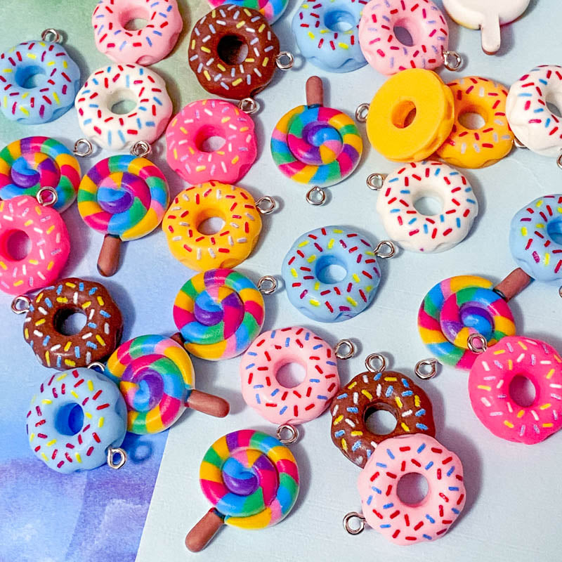 lollipop lolly rainbow lollies donut donuts resin charm charms pendant cute kawaii craft supplies shop store uk bright colours coloured swirl candy pink cerise yellow blue white sprinkles hundreds and thousands doughnut pretty fun jewellery supplies