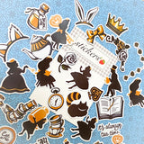 alice in wonderland opaque glossy sticker stickers flake flakes pack of 30 29 black silhouette white brown tan gold eat me mad hatter rabbit cheshire cat we're all mad here tea cup pot crown queen rose roses drink uk cute kawaii stationery planner supplies