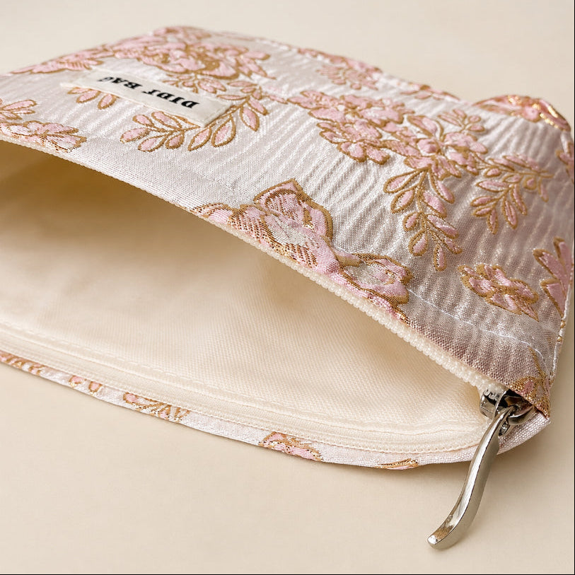 champagne satin fabric woven pouch with gold thread highlights and pink roses design. large cosmetic bag or journaling pouch. uk letterbox gifts