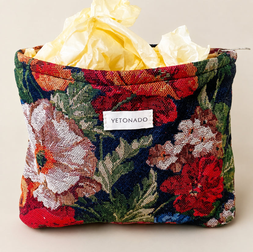 dark floral tapestry woven pouch with concealed zip fastening, lining and gusset. Large cosmetic bag with botanical design and textured fabric. manor garden. 