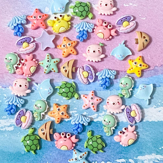 ocean life sea creature creatures small resin acrylic fb flatback flat back facks embellishment uk cute kawaii craft supplies crab seahorse starfish fish turtle turtles octopus ray sting shell shells seashell jellyfish pastel colours pretty bundle 