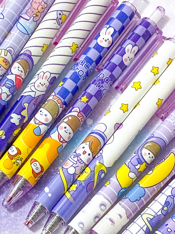 pastel lilac blue purple yellow galaxy starry sky pen pens space theme themed spaceman astronaut stars planet spaceship rocket rabbit bunny bear cat click fineline gel black ink uk cute kawaii stationery planner supplies gift gifts