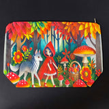 little red riding hood themed canvas zip pouch featuring colourful woodland mushrooms, autumn trees, flowers and a grey wolf companion in a storybook forest scene. red, orange, yellow and lime green colourful gift bag. 