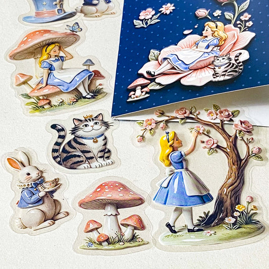 alice's glazed wonderland PET sticker pack of 30 with alice inspired ceramic effect stickers of cheshire cat, white rabbit, teapots, mushrooms and flowers in pastel pink and blue colours. uk stationery shop.