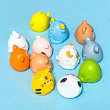 Chinese zodiac animal resin figurines on a blue background