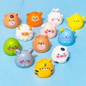 animal signs of the chinese zodiac cute resin figurines on a blue background