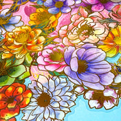 assorted large gold foil floral stickers on a turquoise background