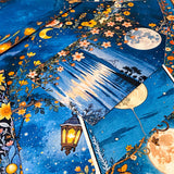 midnight garden scrapbook papers with moon, lantern and floral night sky designs with rich blues and creamy pink