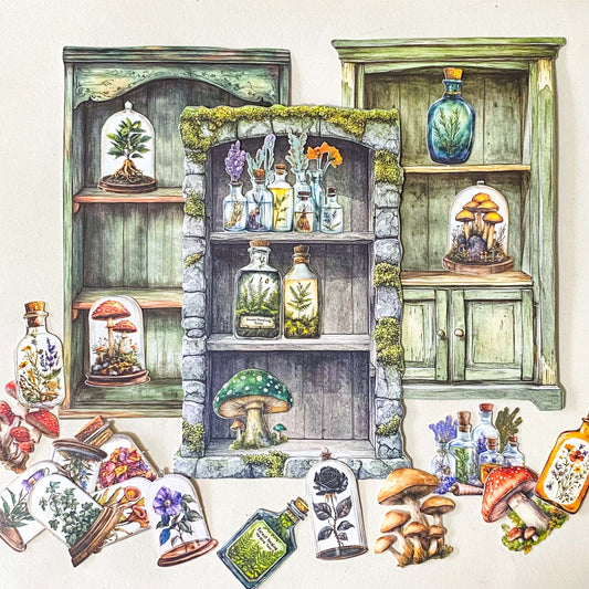 green forest witch apothecary cabinet shelves with paper die cuts of mushrooms, bell jar plants, herbs and potion bottles. witchy ephemera set