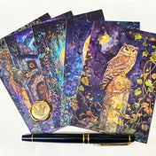 set of 5 moonlit forest postcards with magical owl, spell books, trees and stars. On a cream background with a pen and wax seal