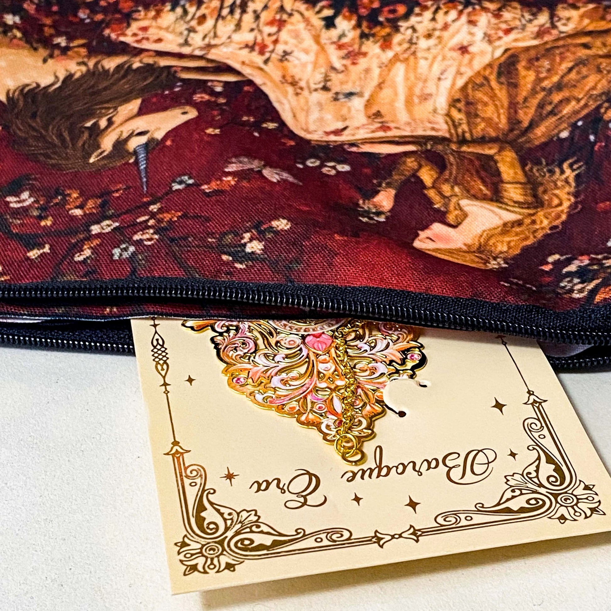 medieval lady and unicorn uk letterbox gift set with ornate gold and pink metal bookmark and tapestry style pouch in deep red tones