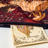 medieval lady and unicorn uk letterbox gift set with ornate gold and pink metal bookmark and tapestry style pouch in deep red tones